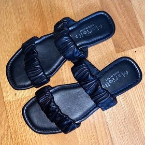 NWOT never worn black leather strappy sandals